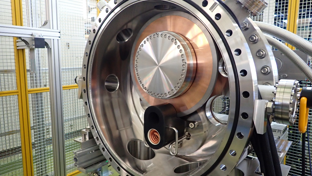 Rotating target and flux concentrator for positron production, under development for the ILC